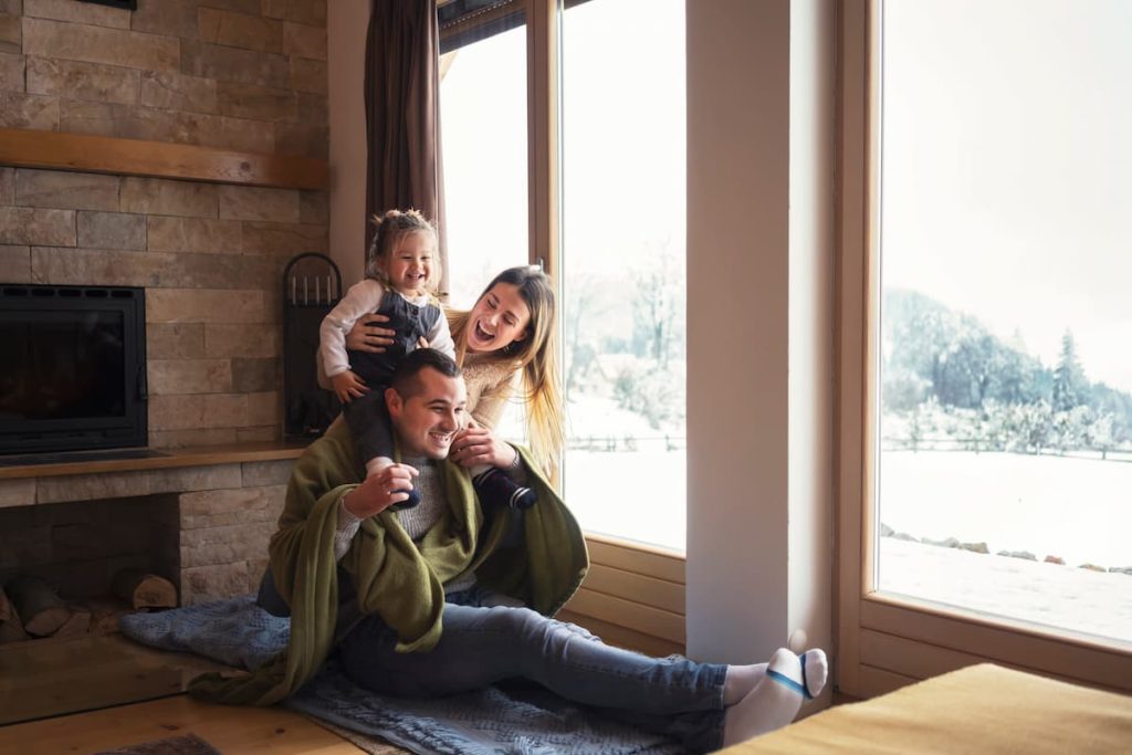 family enjoying their home during the winter months